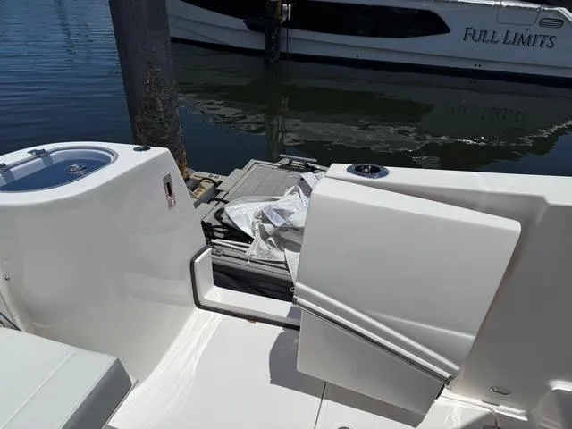  Yacht Photos Pics 2023 Regal 33 SAV boat with open deck area and water view.