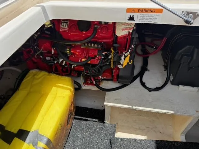  Yacht Photos Pics Engine compartment of 2023 Regal 33 SAV boat with visible EFI system and wiring.