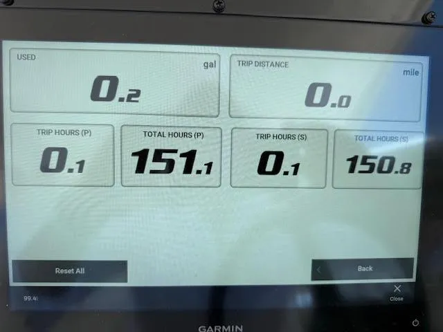  Yacht Photos Pics Display screen of a 2023 Regal 33 SAV showing trip and fuel data.
