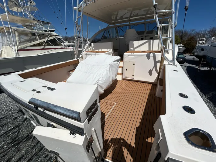 No Slack Yacht Photos Pics 2002 Albemarle 410 Express Fisherman boat with spacious deck and seating area.