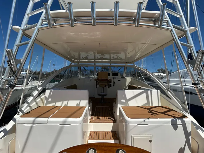 No Slack Yacht Photos Pics 2002 Albemarle 410 Express Fisherman boat interior with seating and helm station.