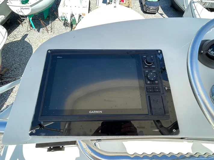 No Slack Yacht Photos Pics Garmin navigation system on 2002 Albemarle 410 Express Fisherman boat dashboard.