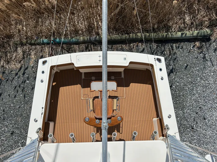 No Slack Yacht Photos Pics Overhead view of 2002 Albemarle 410 Express Fisherman boat deck with wooden flooring.