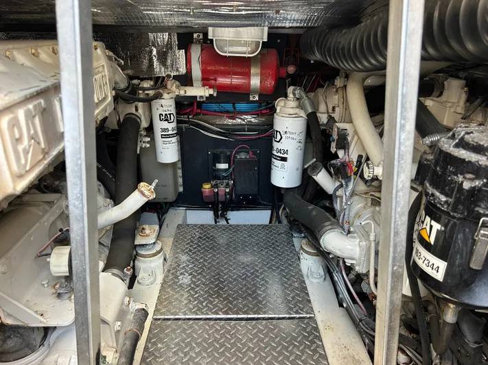 No Slack Yacht Photos Pics Engine room of a 2002 Albemarle 410 Express Fisherman with CAT machinery and components.