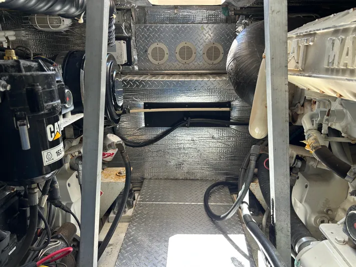 No Slack Yacht Photos Pics Engine room of 2002 Albemarle 410 Express Fisherman with visible machinery and components.