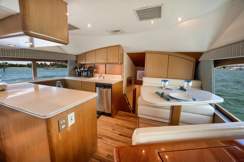Positive Attitude Yacht Photos Pics Ocean 57 Positive Attitude - Interior Dinetee/Galley