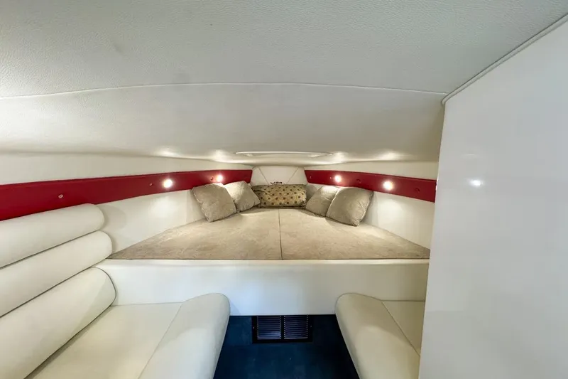  Yacht Photos Pics Interior cabin of 2022 Velocity 290sc boat with cozy seating and cushions.