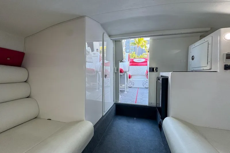  Yacht Photos Pics Interior of 2022 Velocity 290sc boat with white seating and modern design.