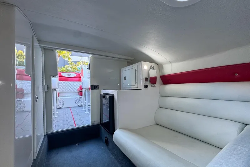 Yacht Photos Pics Interior of 2022 Velocity 290sc boat with white seating and compact cabin design.