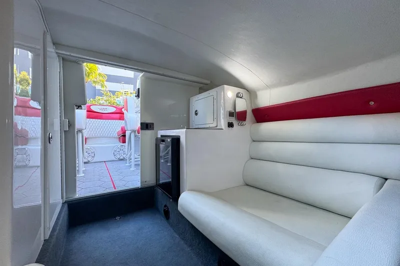  Yacht Photos Pics Interior of 2022 Velocity 290sc boat with white seating and modern amenities.
