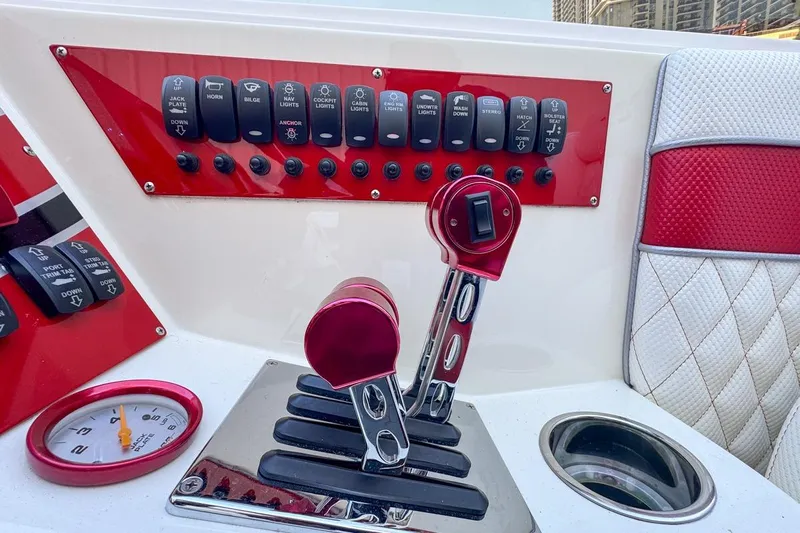  Yacht Photos Pics Control panel of 2022 Velocity 290sc boat with switches and throttle levers.