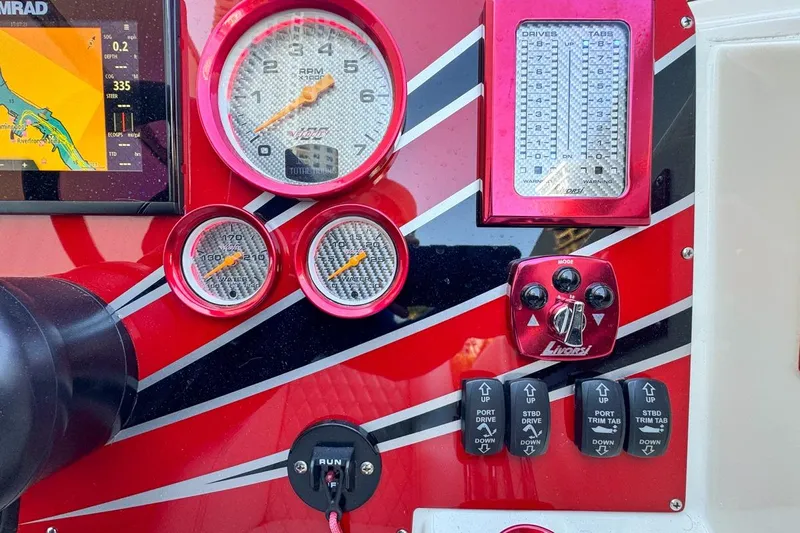  Yacht Photos Pics Dashboard of a 2022 Velocity 290sc boat with gauges and controls.
