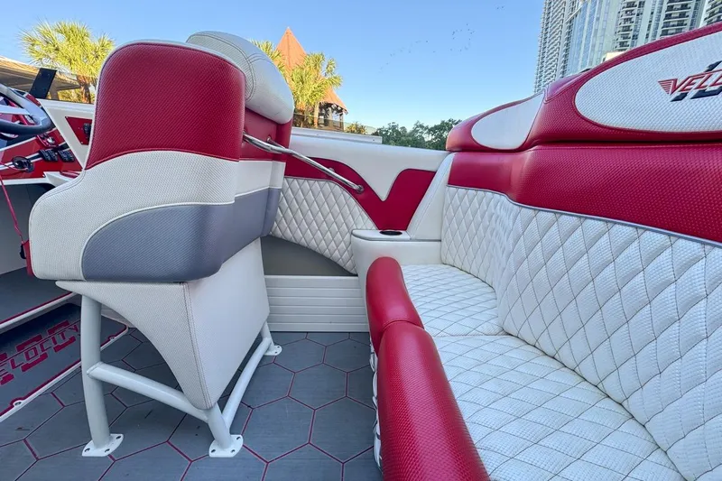  Yacht Photos Pics Interior of 2022 Velocity 290sc boat with red and white seating.