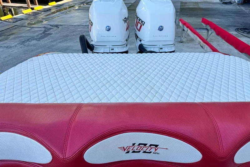  Yacht Photos Pics 2022 Velocity 290sc boat with dual outboard engines and quilted seating.