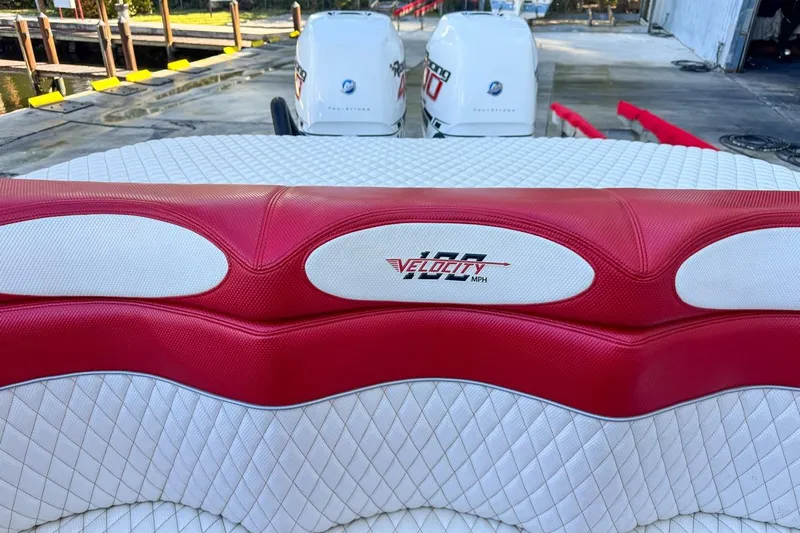  Yacht Photos Pics Red and white seating on 2022 Velocity 290sc boat with twin engines.