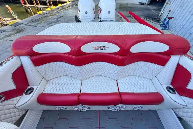  Yacht Photos Pics Red and white seating on 2022 Velocity 290sc boat, featuring quilted upholstery design.
