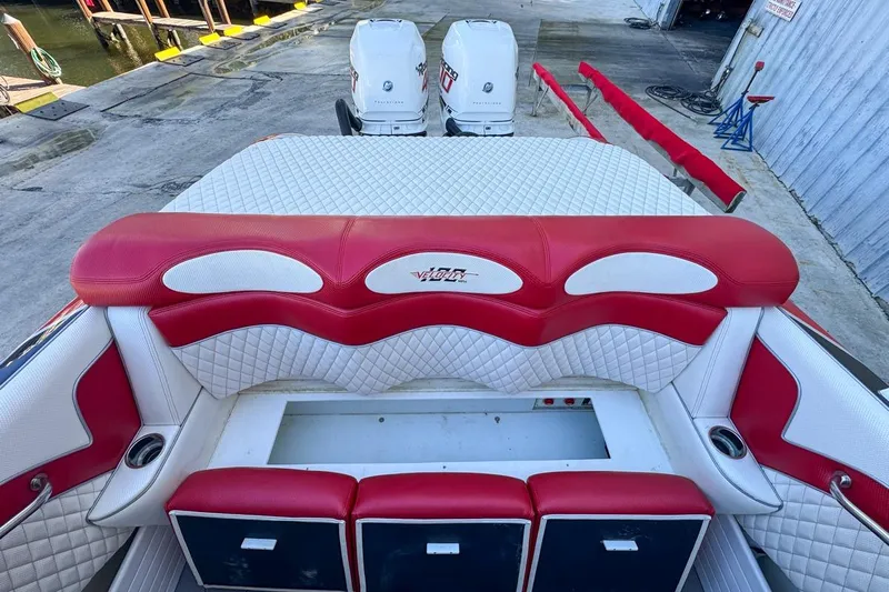  Yacht Photos Pics Red and white interior of 2022 Velocity 290sc boat with dual engines.