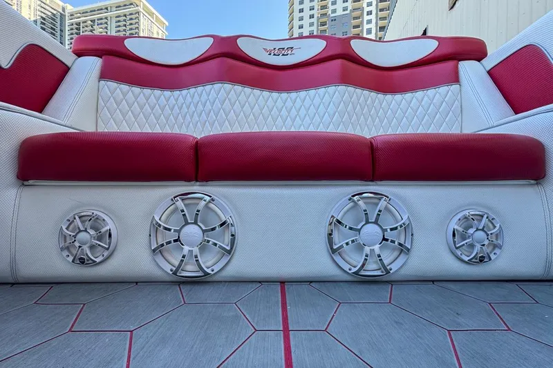  Yacht Photos Pics Red and white seating with speakers on a 2022 Velocity 290sc boat.