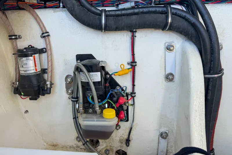  Yacht Photos Pics Engine compartment of 2022 Velocity 290sc boat with wiring and components.