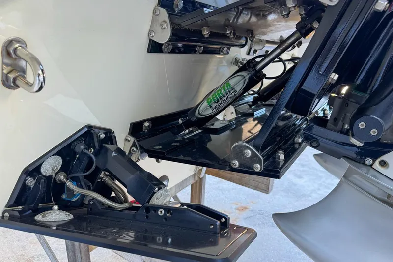  Yacht Photos Pics Close-up of 2022 Velocity 290sc boat's hydraulic system and propeller components.