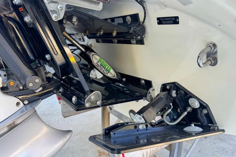  Yacht Photos Pics 2022 Velocity 290sc boat engine components and hydraulic system close-up.