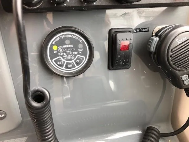Good Fun Yacht Photos Pics Control panel of a 2006 Pursuit 3370 Offshore boat with gas vapor detector.