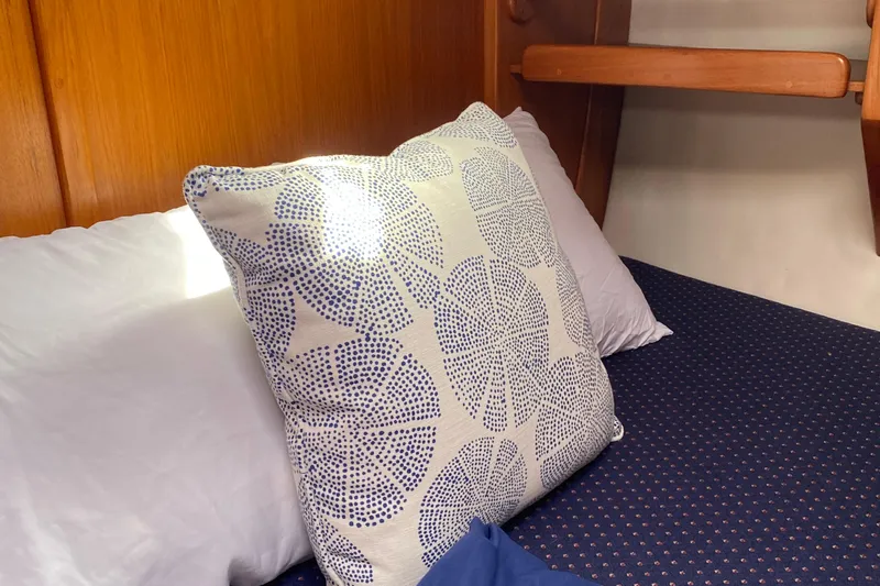 Harriet Tubman Yacht Photos Pics Cozy cabin bed with patterned pillow in 2002 Caliber 40 yacht interior.