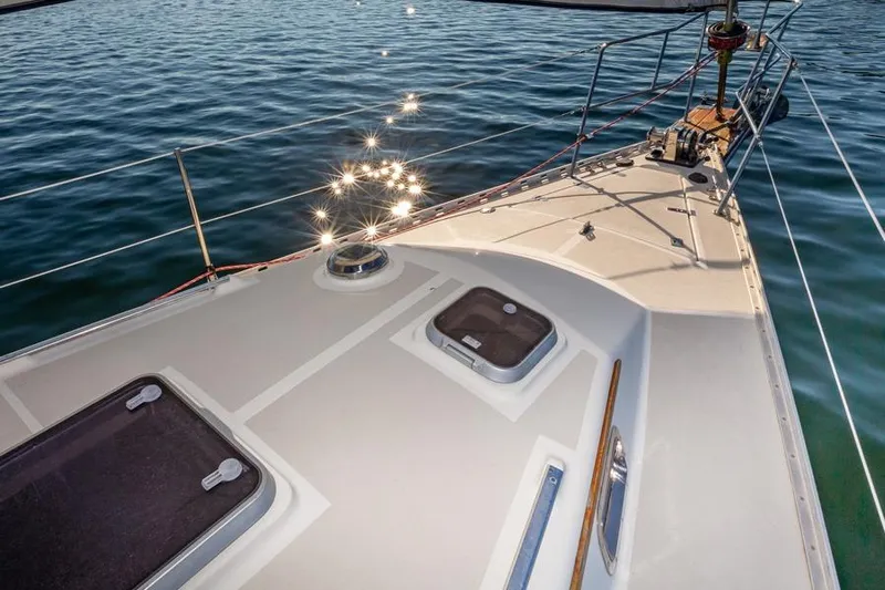 Harriet Tubman Yacht Photos Pics Deck of 2002 Caliber 40 sailboat with sparkling water reflections.