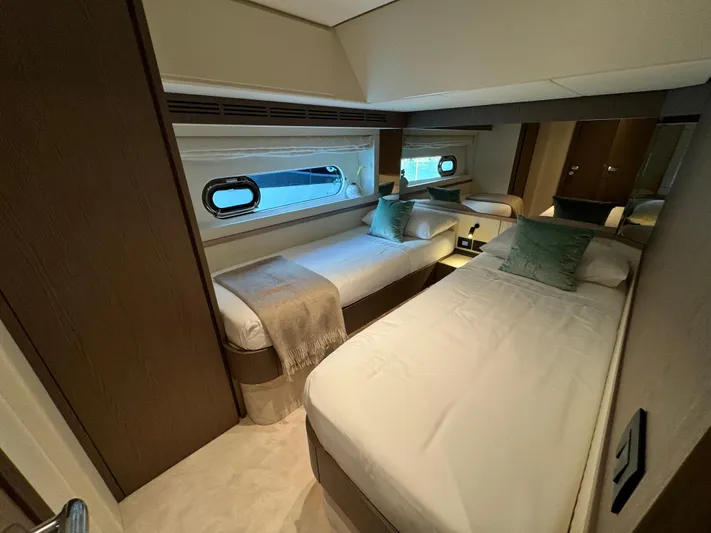  Yacht Photos Pics Luxurious twin cabin interior of 2025 Azimut Magellano 66 yacht.