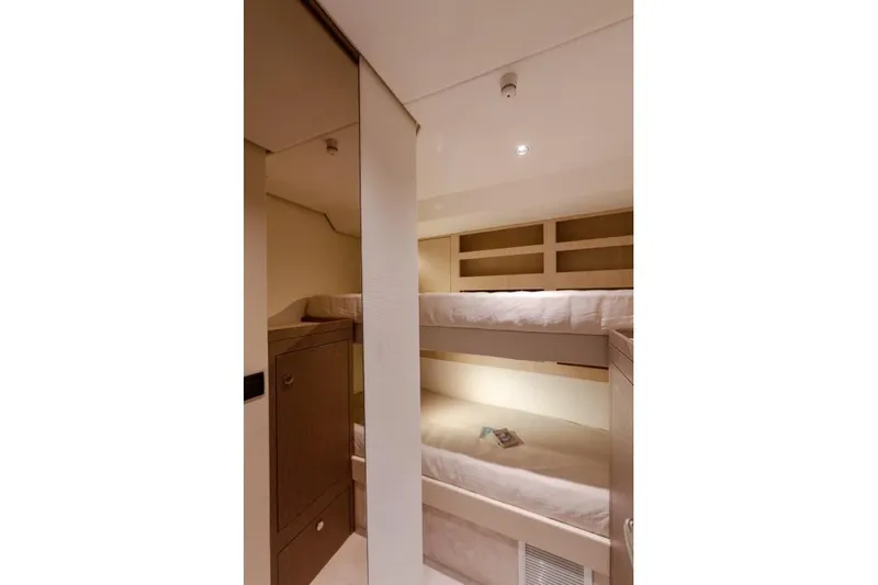  Yacht Photos Pics Interior of 2025 Azimut Magellano 66 yacht with cozy bunk beds.
