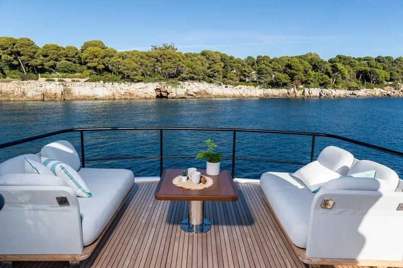  Yacht Photos Pics Luxurious deck of 2025 Azimut Magellano 66 yacht with scenic ocean view.