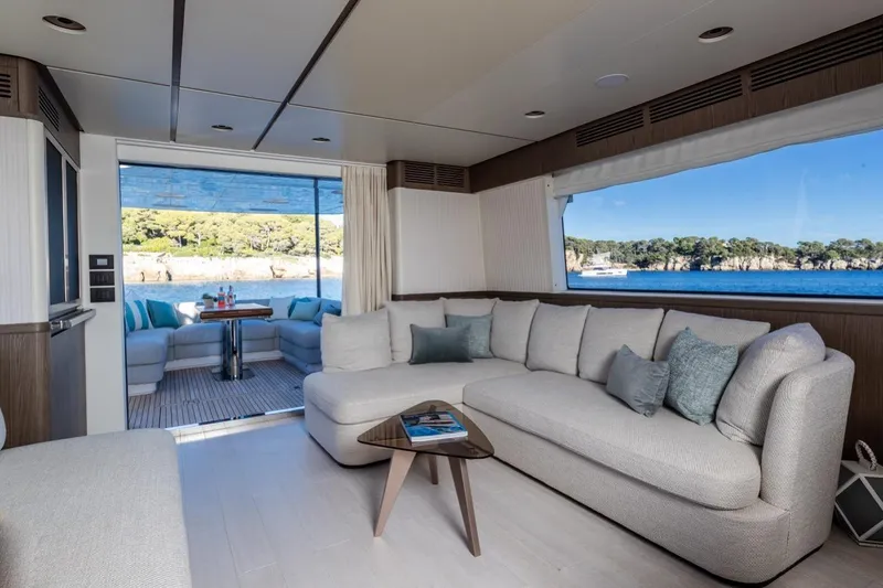  Yacht Photos Pics Luxurious interior of 2025 Azimut Magellano 66 yacht with scenic ocean view.
