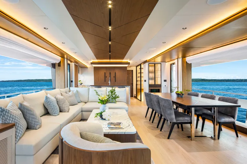 Horizon Fd80-617 / Now Available Yacht Photos Pics Luxurious interior of 2026 Horizon FD80 yacht with elegant seating and dining area.