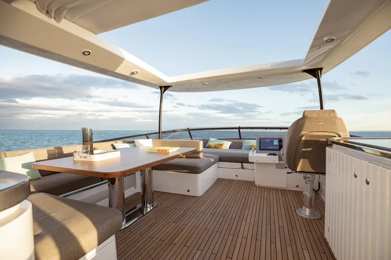  Yacht Photos Pics Luxurious deck of 2025 Azimut Magellano 66 yacht with ocean view.