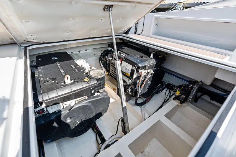 R01 Yacht Photos Pics Engine compartment of 2023 VanDutch 32 yacht, showcasing modern mechanical components.