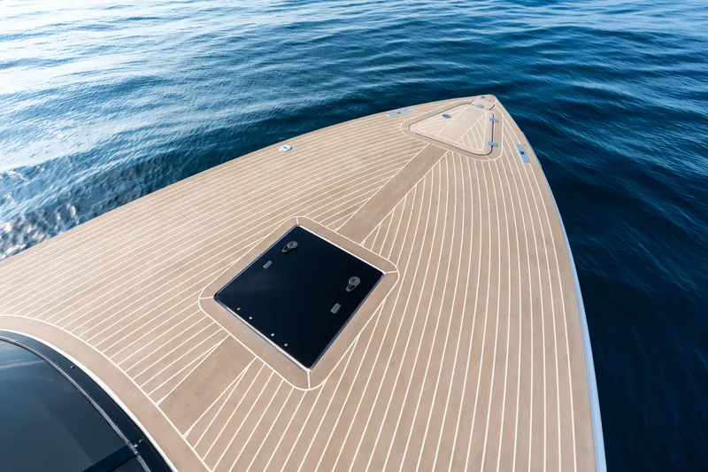 R01 Yacht Photos Pics 2023 VanDutch 32 yacht deck with sleek design on calm blue water.