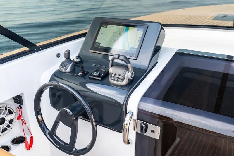 R01 Yacht Photos Pics 2023 VanDutch 32 yacht helm with modern navigation controls and touchscreen display.