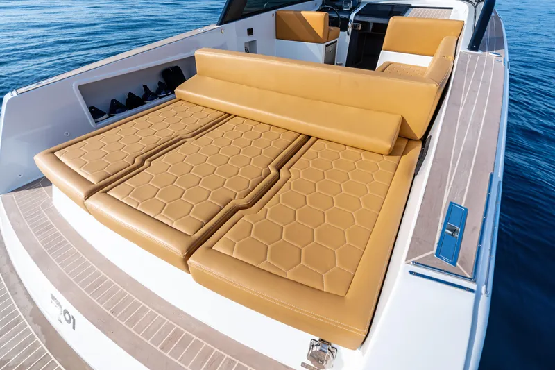 R01 Yacht Photos Pics 2023 VanDutch 32 yacht with luxurious tan leather seating on open water.