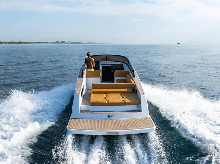 R01 Yacht Photos Pics 2023 VanDutch 32 yacht cruising on open water, showcasing sleek design and luxury.