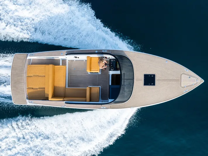 R01 Yacht Photos Pics 2023 VanDutch 32 luxury yacht cruising on open water, aerial view.