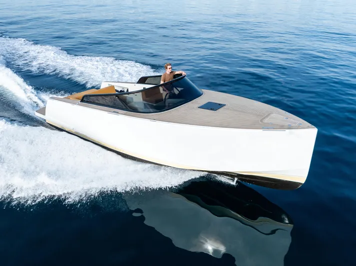 R01 Yacht Photos Pics 2023 VanDutch 32 yacht cruising on open water, showcasing sleek design and luxury.