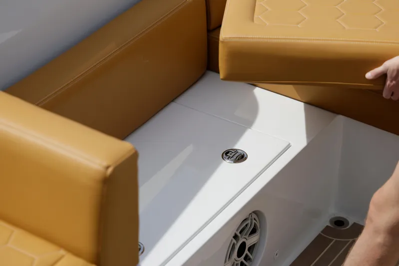 R01 Yacht Photos Pics Luxurious seating on 2023 VanDutch 32 yacht with tan cushions and sleek design.
