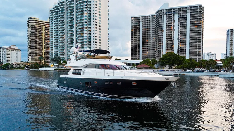 Kristina Yacht Photos Pics Luxury Princess 23M yacht cruising near high-rise buildings, 2007 model.