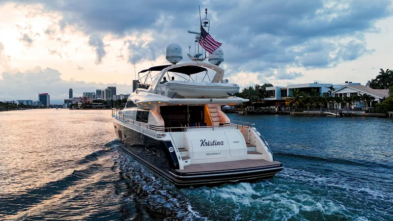 Kristina Yacht Photos Pics Luxury yacht cruising at sunset, Princess 23M, 2007 model, on a scenic waterway.