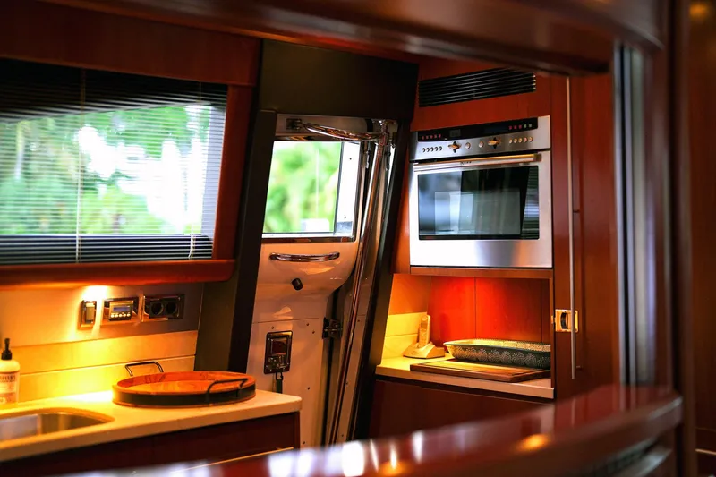 Kristina Yacht Photos Pics Luxurious yacht kitchen interior with modern appliances, Princess 23M, 2007 model.