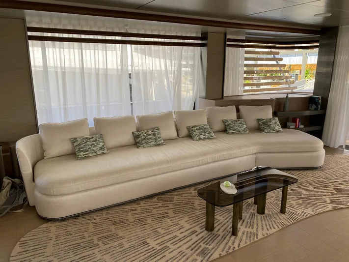  Yacht Photos Pics Luxurious interior of 2024 Azimut Magellano 30M yacht with elegant sofa and modern decor.