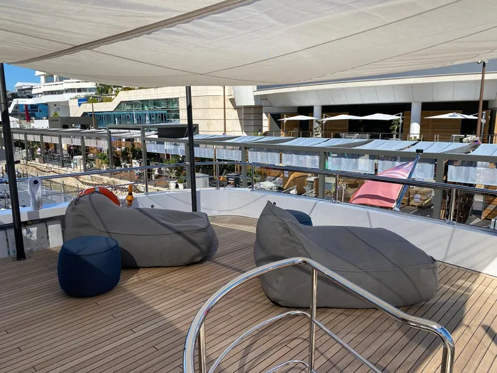  Yacht Photos Pics Deck of 2024 Azimut Magellano 30M yacht with bean bags and canopy.