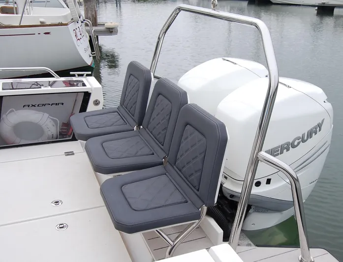  Yacht Photos Pics 2019 Axopar 37 SC boat with Mercury engine and three cushioned seats.