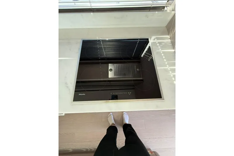 Svetlana Yacht Photos Pics Modern kitchen induction cooktop on Sunseeker 76 Yacht, 2025 model.