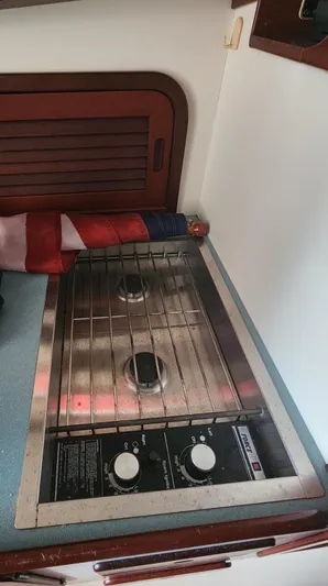 Stardust Yacht Photos Pics Stove inside 1996 Hinckley Picnic Boat with two burners and control knobs.